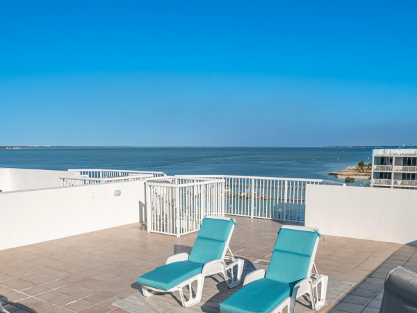 Sweeping views of Bay and Gulf from Private rooftop patio